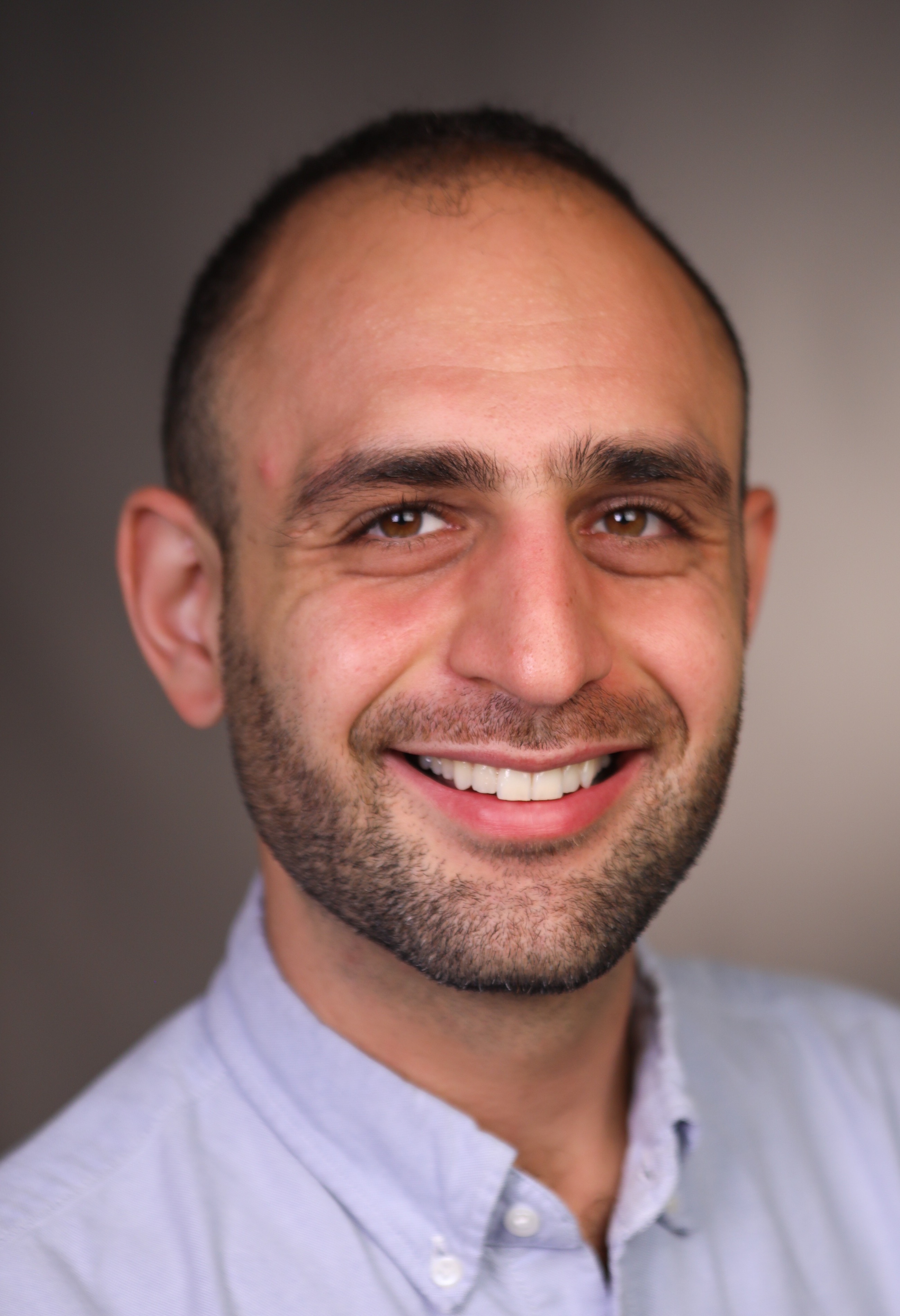 Portrait photo of Berk Ustun